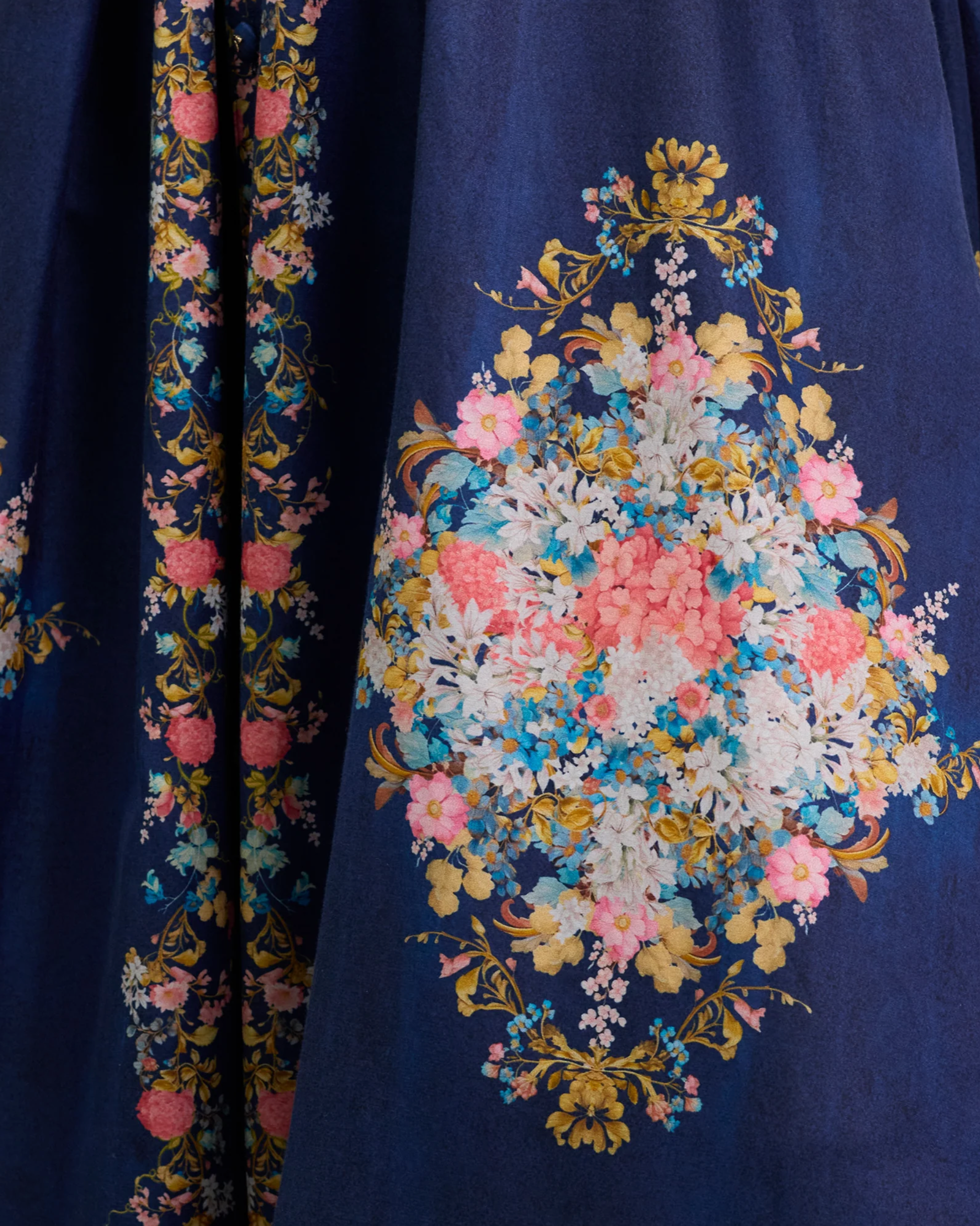 Navy blue fabric with floral embroidery